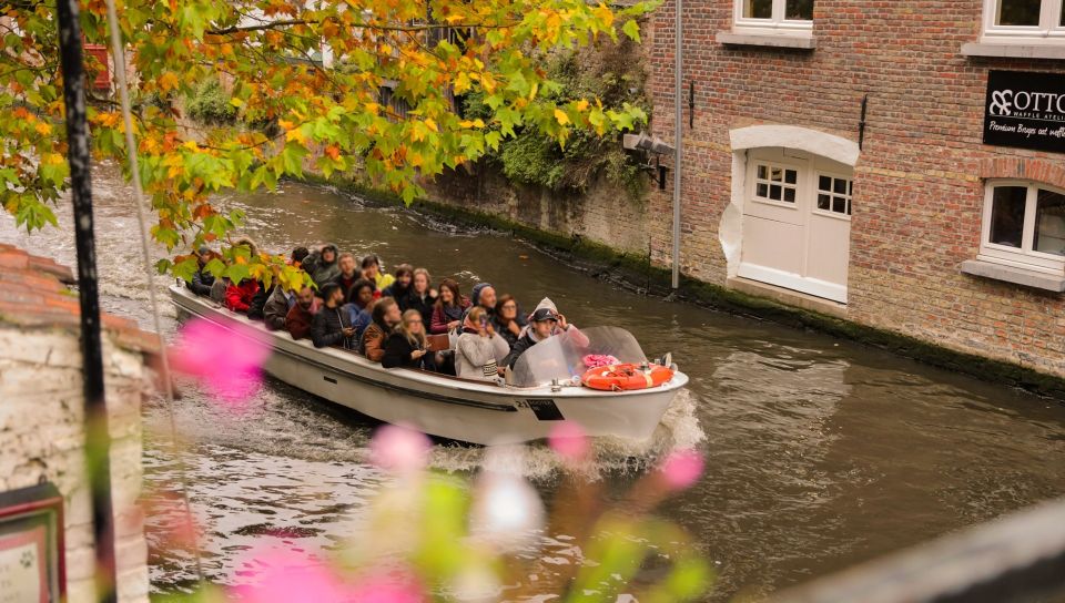 From Paris: Day Trip to Bruges with Optional Seasonal Cruise - The guided walking tour: City Hall, Place du Bourg, and the Holy Blood