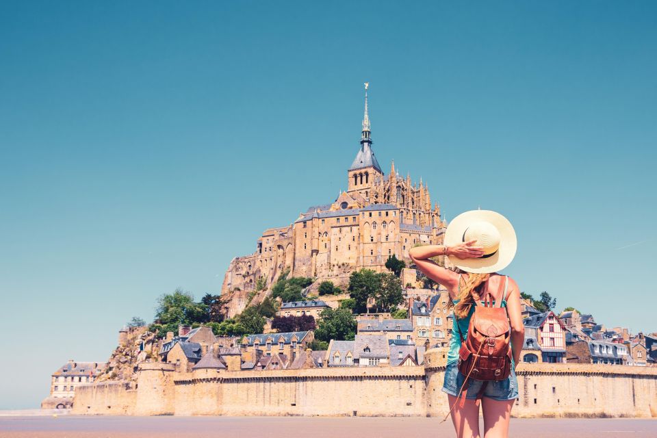 From Paris: Mont Saint Michel Day Trip with a Guide - Free Shuttle and Parking: Expect a Short Wait Sometimes