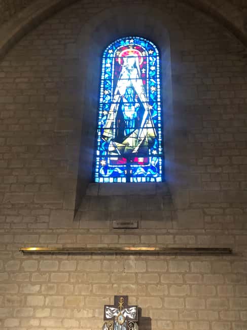 Montmartre for Art Lovers - Walking tour with Expert Guide - Le Passe-Muraille and Square Suzanne Buisson: Tiny Stops With Big Payoff