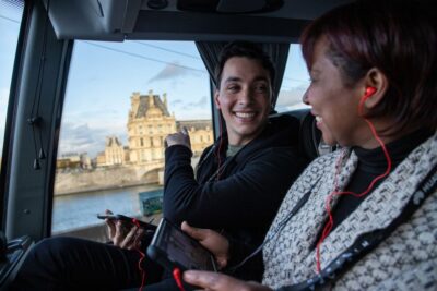 Paris: Audio-Guided Bus Tour & Seine River Cruise - The luxury coach: panoramic Paris with tablet-style context