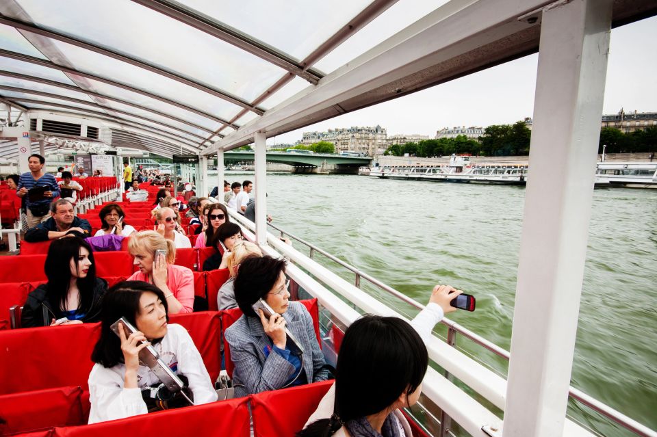 Paris: Audio-Guided Bus Tour & Seine River Cruise - Weather, comfort, and staying warm without missing the views