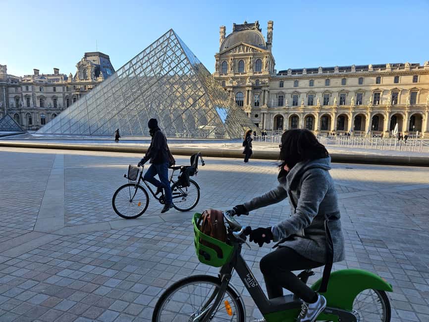 Paris Before the Crowds: Sunrise Bike Tour with Breakfast - Crossing Alexander III Bridge in near-silence