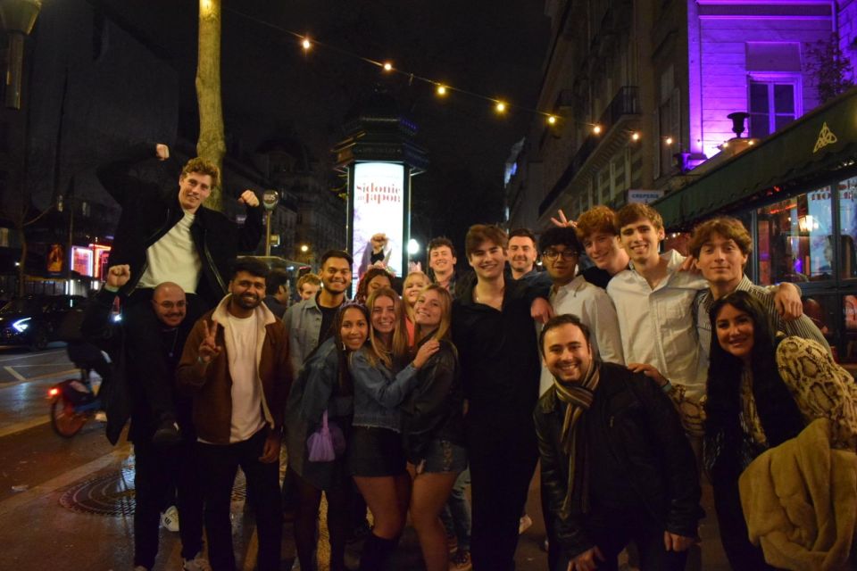 Paris: City Center Guided Pub Crawl with Shots & Club Entry - Châtelet nightlife, Porte-Saint-Denis photo stop, and a walkable route