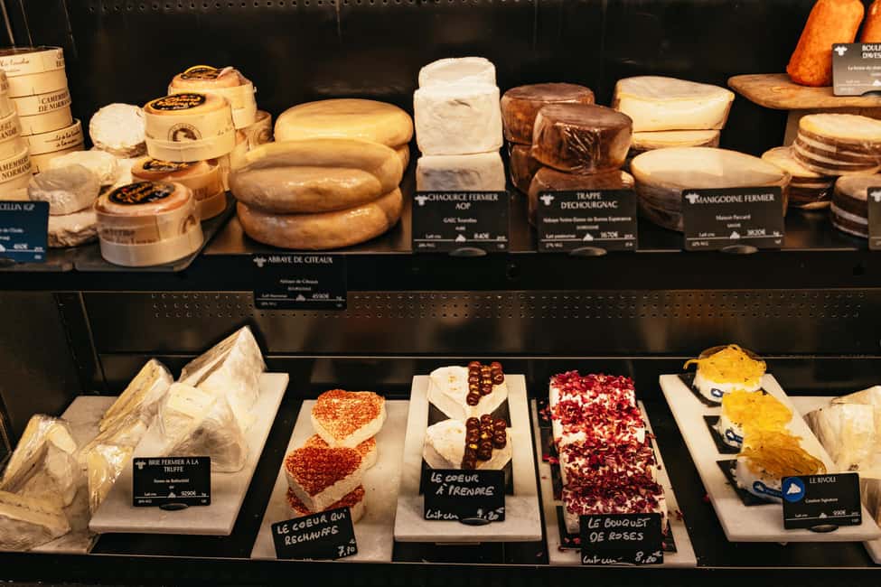 Paris: Gourmet Food Tour with Over 10 Tastings and Wine - The famous street market and the Louis XV pastry connection