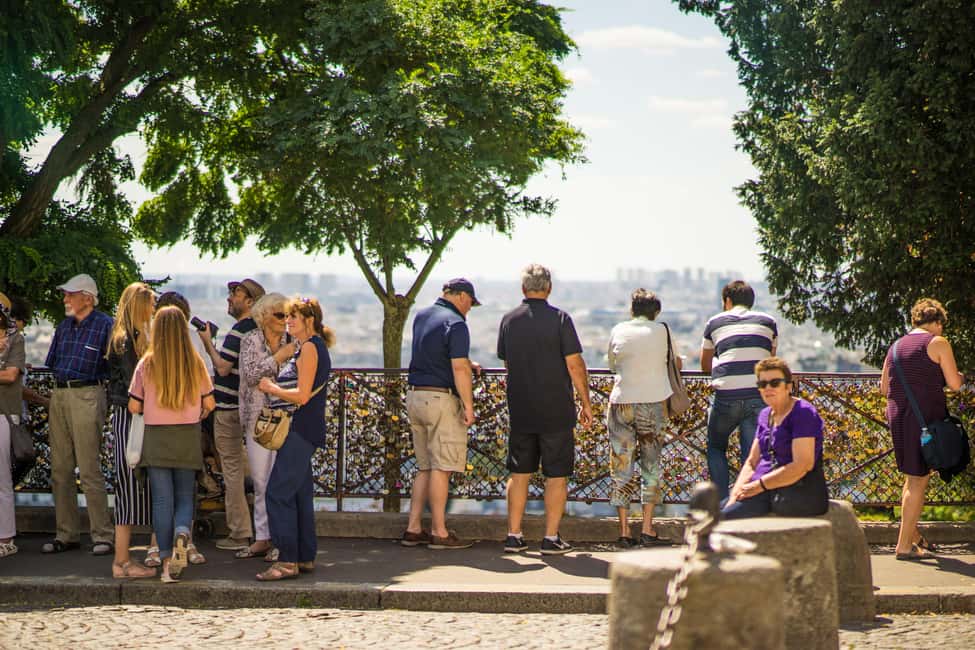 Paris Montmartre: 2-Hour City Tour in German - Sacré-Cœur basilica: The big view moment on the hill