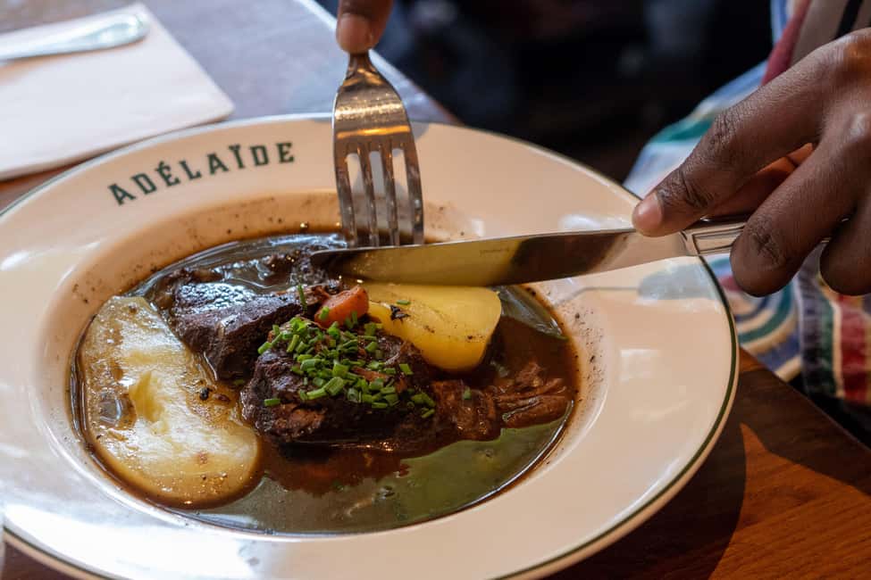 Paris: Montmartre Food Tour with Full Meal - Place des Abbesses: Stop, Taste, and Reset
