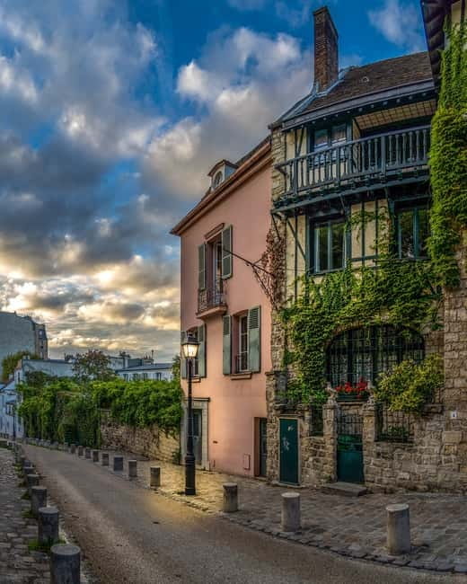 Paris: Montmartre Highlights Walking Tour with a Local Guide - Starting under Sacré-Cœur at Place Saint-Pierre