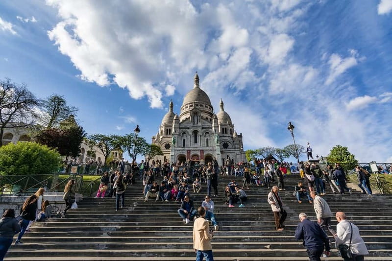 Paris: Montmartre Highlights Walking Tour with a Local Guide - The Wall of Love: what to notice beyond the Instagram shot