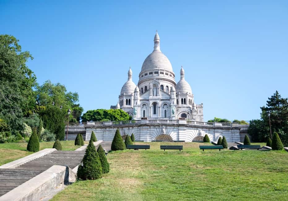 Paris: Montmartre, Notre-Dame, & Louvre Tour with Cruise - The Wall of Love, Place du Tertre, and the short photo stops that make the day fun