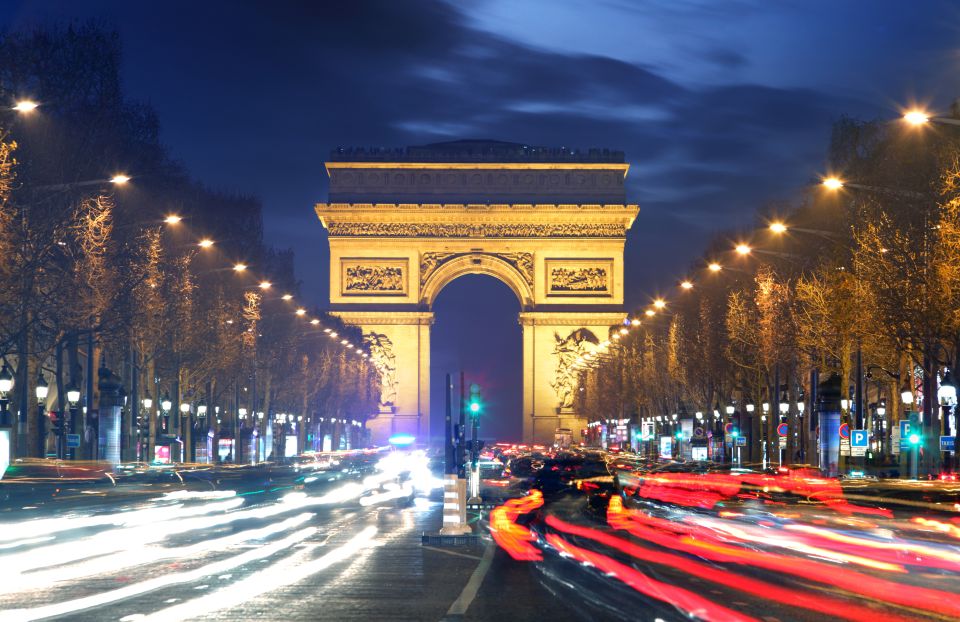 Paris: Panoramic Night Tour with Audio Guide and Host - Open-deck air-conditioned coach: the best part and the tradeoff