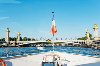 Paris: Seine River Panoramic Views Dinner Cruise - Inside the boat: cocotte dinner, panoramic windows, and terrace air